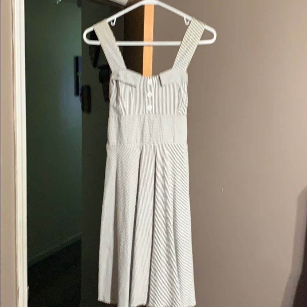 Knee length summer dress.